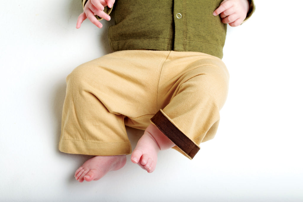 Horsey baby pants in Buckskin beige, luxury machine-wash cashmere & cotton blend, contrast colour cuffs, sizes 00000–0